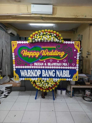 Papan Bunga di Taban Jambe